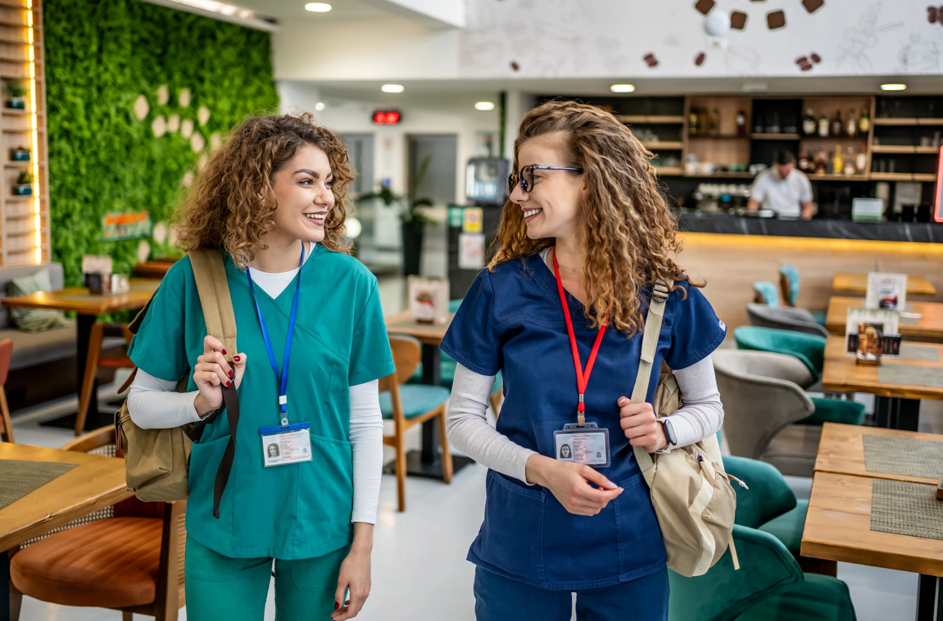 Nurses chatting in a modern café
