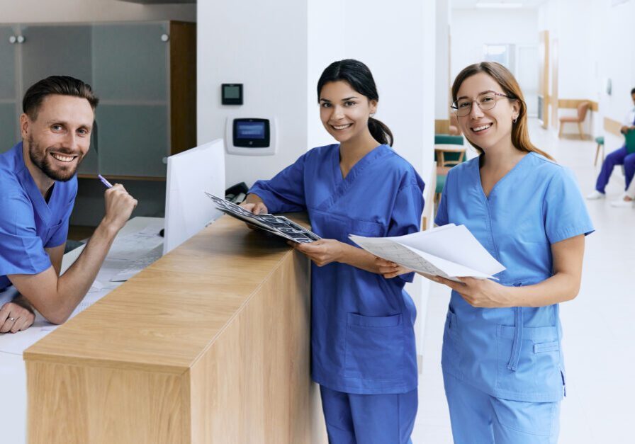 Healthcare professionals holding documents